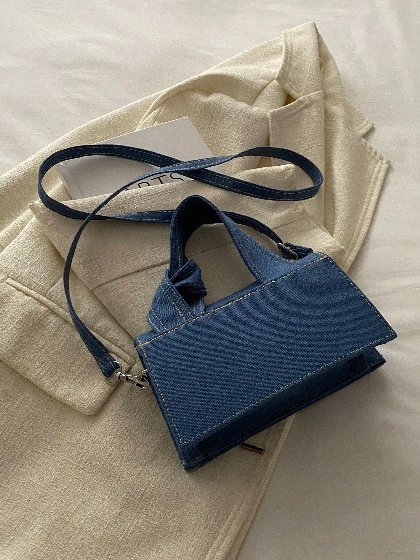 A Minimalist Vintage Mini Handbag Square Bag With Adjustable Long Shoulder Strap