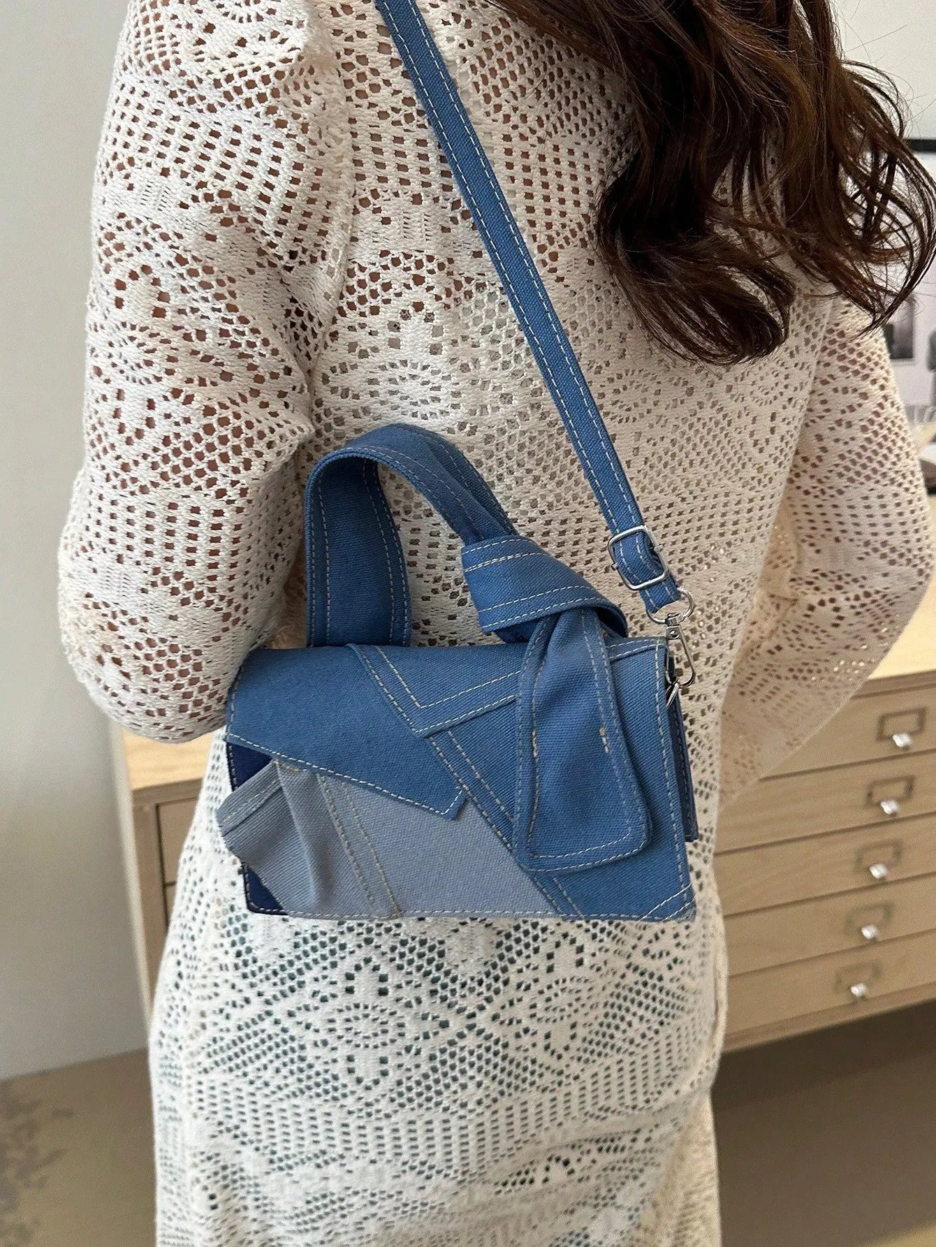 A Minimalist Vintage Mini Handbag Square Bag With Adjustable Long Shoulder Strap