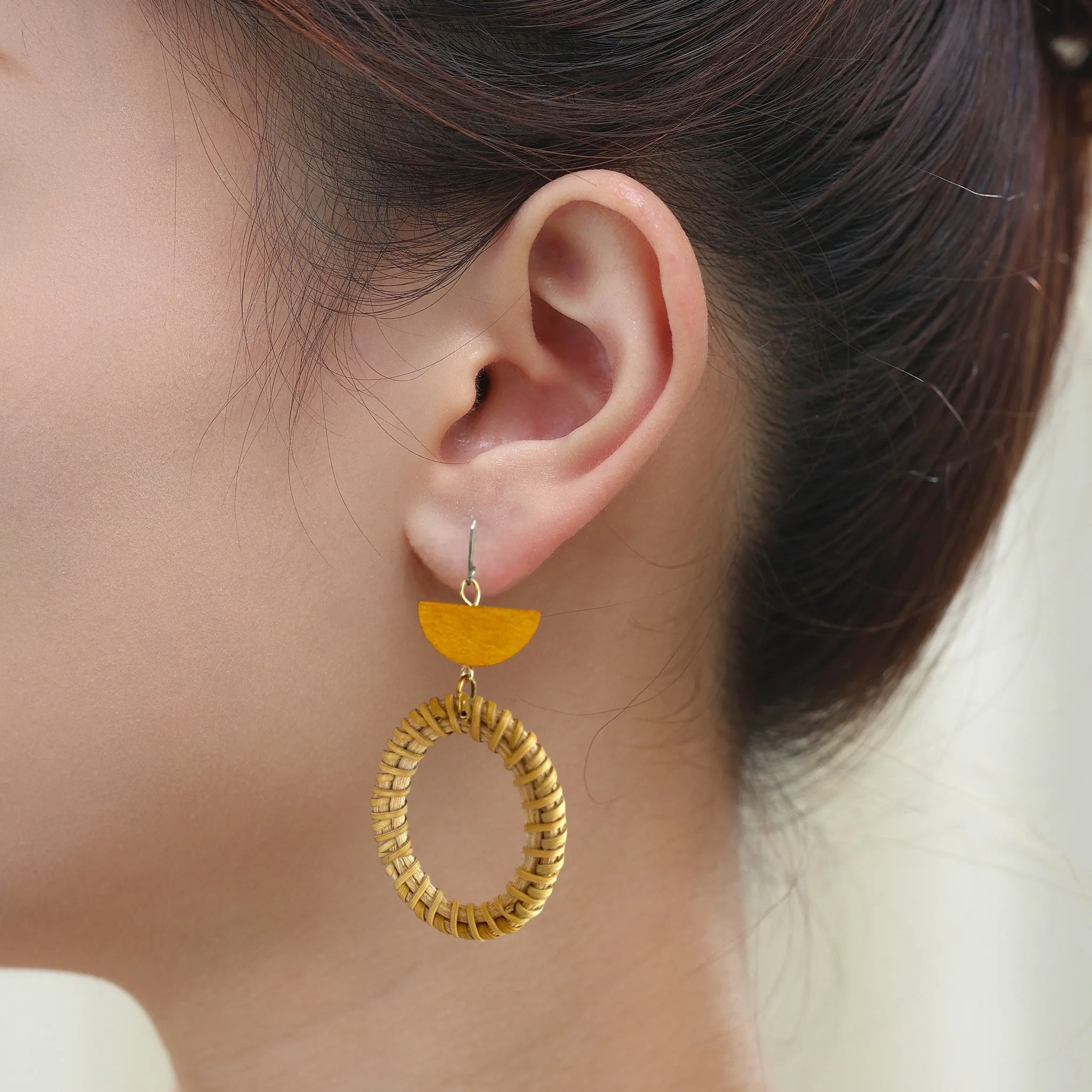 Bohemia style wicker and wood geometric earrings.