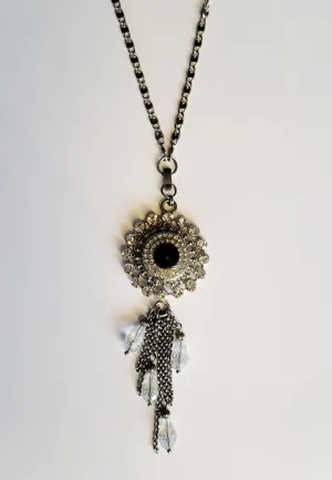Necklace with detachable tassle pendant and snap